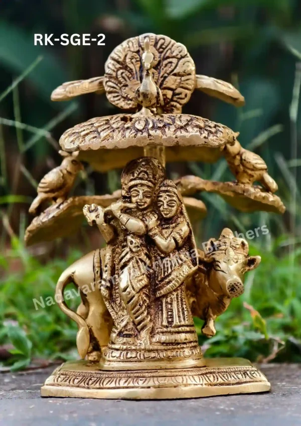 radhakrishna cow under a small tree