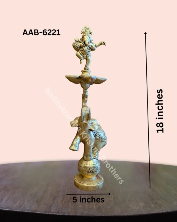 Ganesha standing deepak on top of Elephant