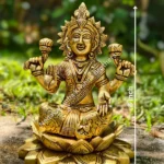 LAKSHMI SITTING ON LOTUS BASE