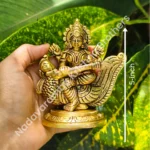 Saraswathi Sitting On Peacock